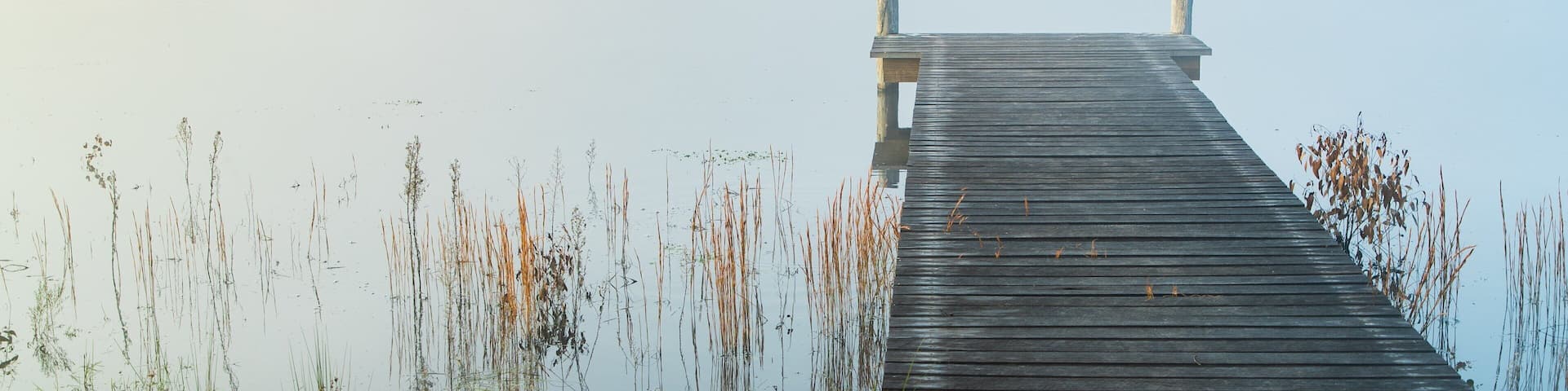 Storm King Dam featuring mist or fog and a lake or waterhole