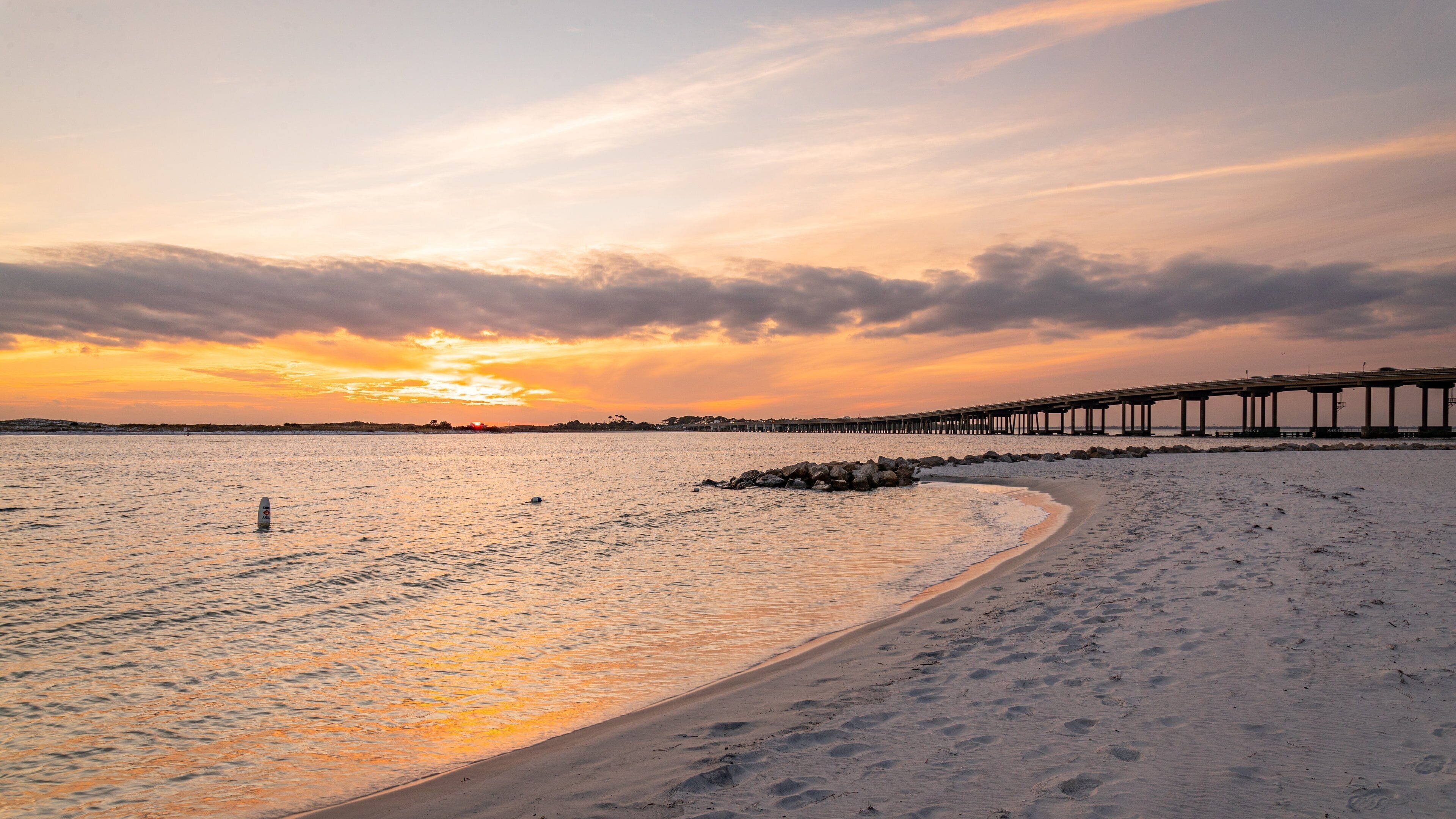 Destin showing a sunset, general coastal views and a sandy beach