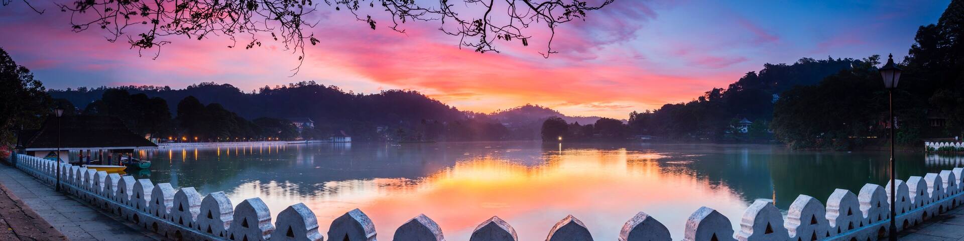 Sunrise at Kandy Lake and the Clouds Wall (Walakulu Wall), Kandy, Central Province, Sri Lanka