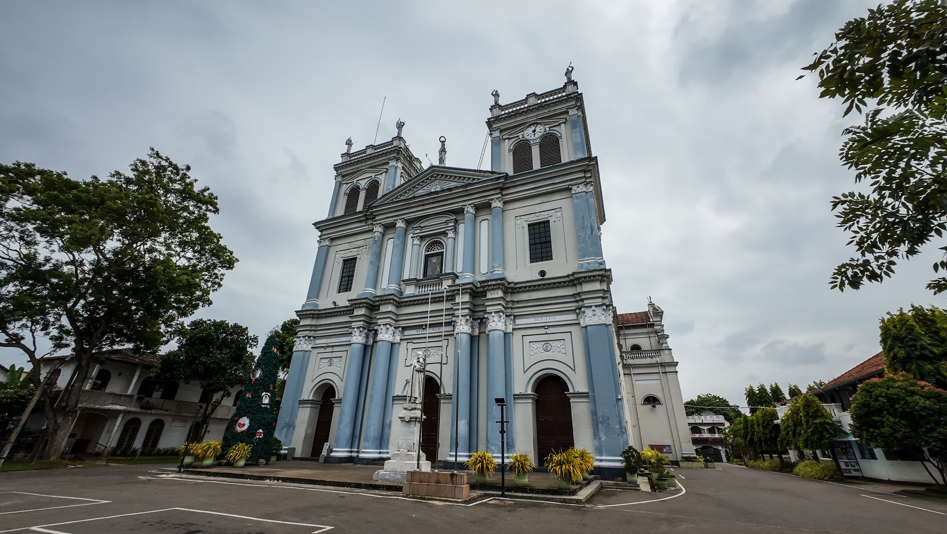 A large, historic church with a prominent bell tower and detailed facade.