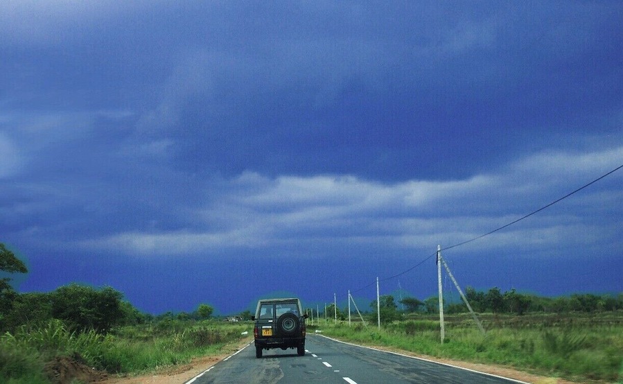 When we reached to Madawachchiya, the sky was dark grey and it signed us a huge rain. This vehicle owned by the Sri Lankan army.
Most of the time vehicles are rare on this country-side roads in northern part of Sri Lanka.