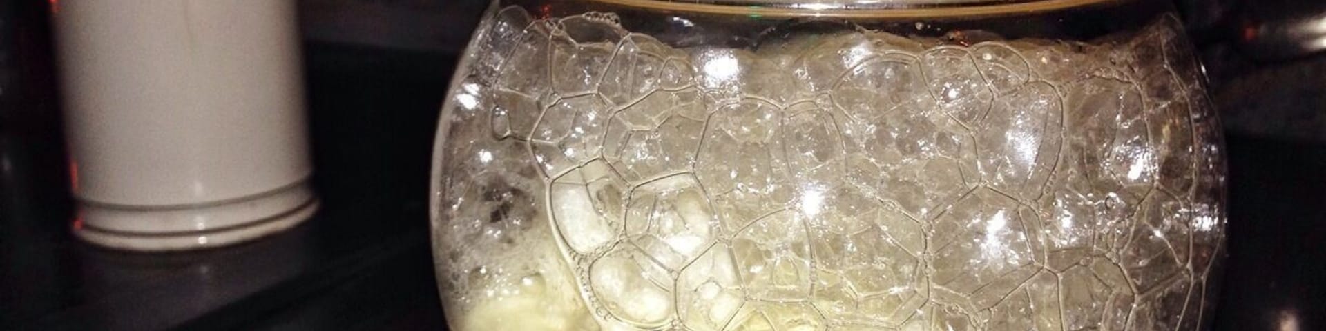 This amazing dessert was served in a fishbowl, just like the other five courses. Inside was a crème Chiboust with sour red current jelly, almond praline, rice crackers and orange blossom bubbles. Topping it off was a disc of shaved ice infused with redwood stems.  Pretty imaginative and incredible tasty.