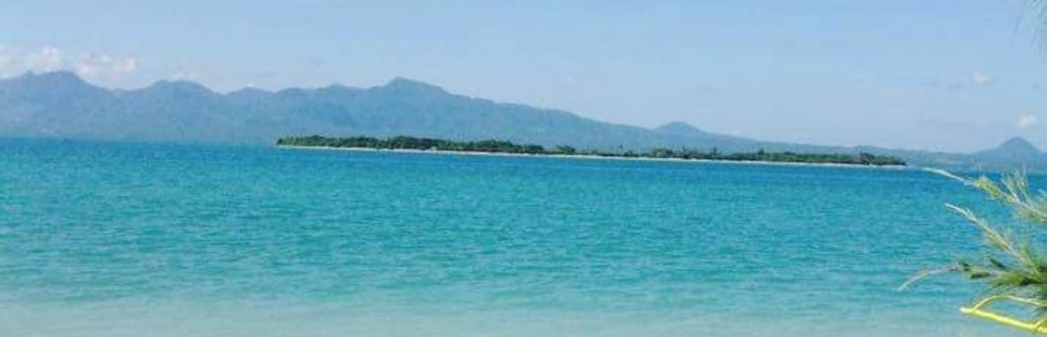 A remote island that has a long beach sand. Great place to unwind. Make sure you have all your supplies. If you want to get away from the hustle and bustle of the city, pack your tent and goods and make a weekend escape in this island.