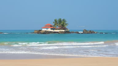 Buddhist temple, Seenigama Muhudu Viharaya, coral reef in the Indian ocean. The neighborhood of Hikkaduwa, Sri Lanka