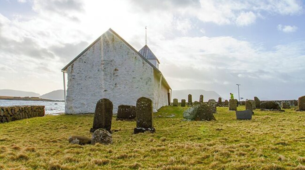 Two churches are located at Kyrkjebø, St. Magnus Cathedral, built around the year 1300 and Olavskirken from year 1111, named after Olav Tryggvason and is the only medieval church still in use on the Faroe Islands. This is Olavskirken. Read more on: http://www.travelwithallsenses.com/faroe-islands-treat-for-all-senses/