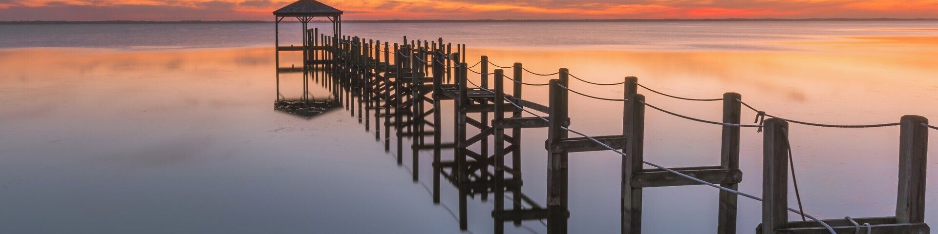 One of the northernmost towns along the coast in North Carolina, Duck is an idyllic town on the shores of the Currituck Sound. This shot was taken from the town's boardwalk while looking West over the sounds. It is advisable to visit the location in Winter as that is off season - so you can spend more time taking in the beauty of the North Carolina coastline and also sunsets are usually much more picturesque around the time owing to the cooler temperatures and lower amount of atmospheric haze.
Plenty of things around Duck to see. Further north, there is the Currituck Lighthouse where you can climb the steps to the top of the lighthouse. North of Corolla, there is an area where you can drive along the coast on the sand - 4X4s a must. Here you can spot some Spanish Mustangs, horses out in the wild. If you're lucky, you can spot them running along the beach in the surf. I'd recommend taking a tour through the Corolla Wild Horse Fund - the money from the tours is used to help the wild horses in every which way possible and the staff are knowledgeable and friendly.
Thank you for stopping by and for the support.
#colorful #goldenhour #weekend #waterlust #bestof5