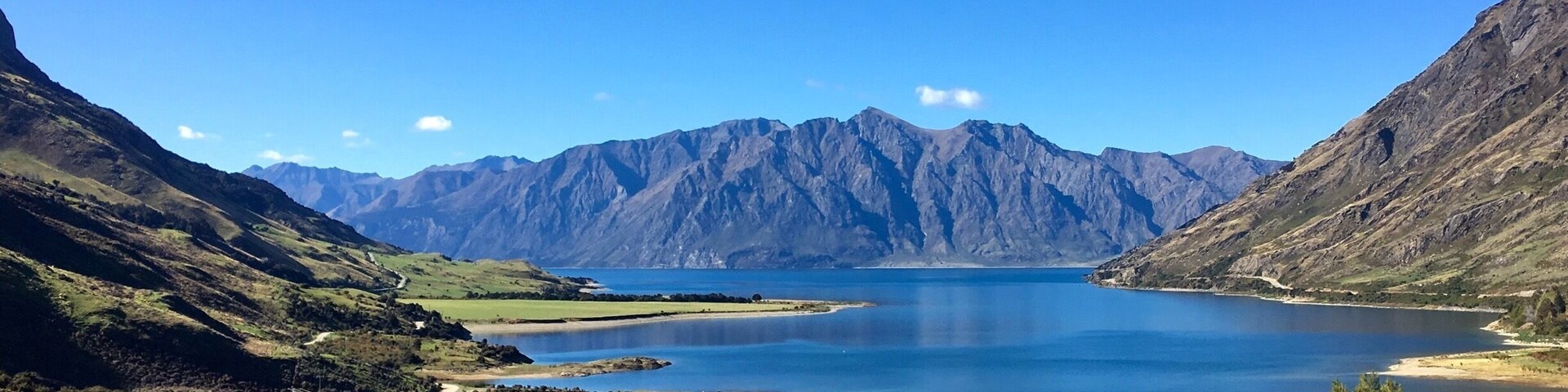 Beautiful blue skies and blue lakes... road trips in NZ never get boring! This is Lake Hawea. #nz #blue