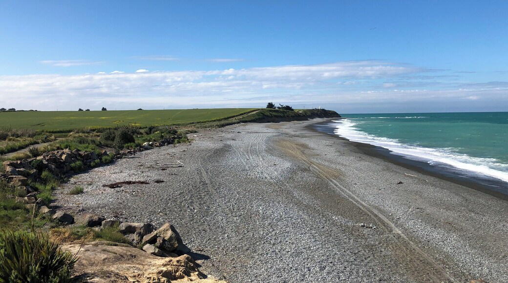 In the distance, you can see a tiny lighthouse. Timaru, New Zealand