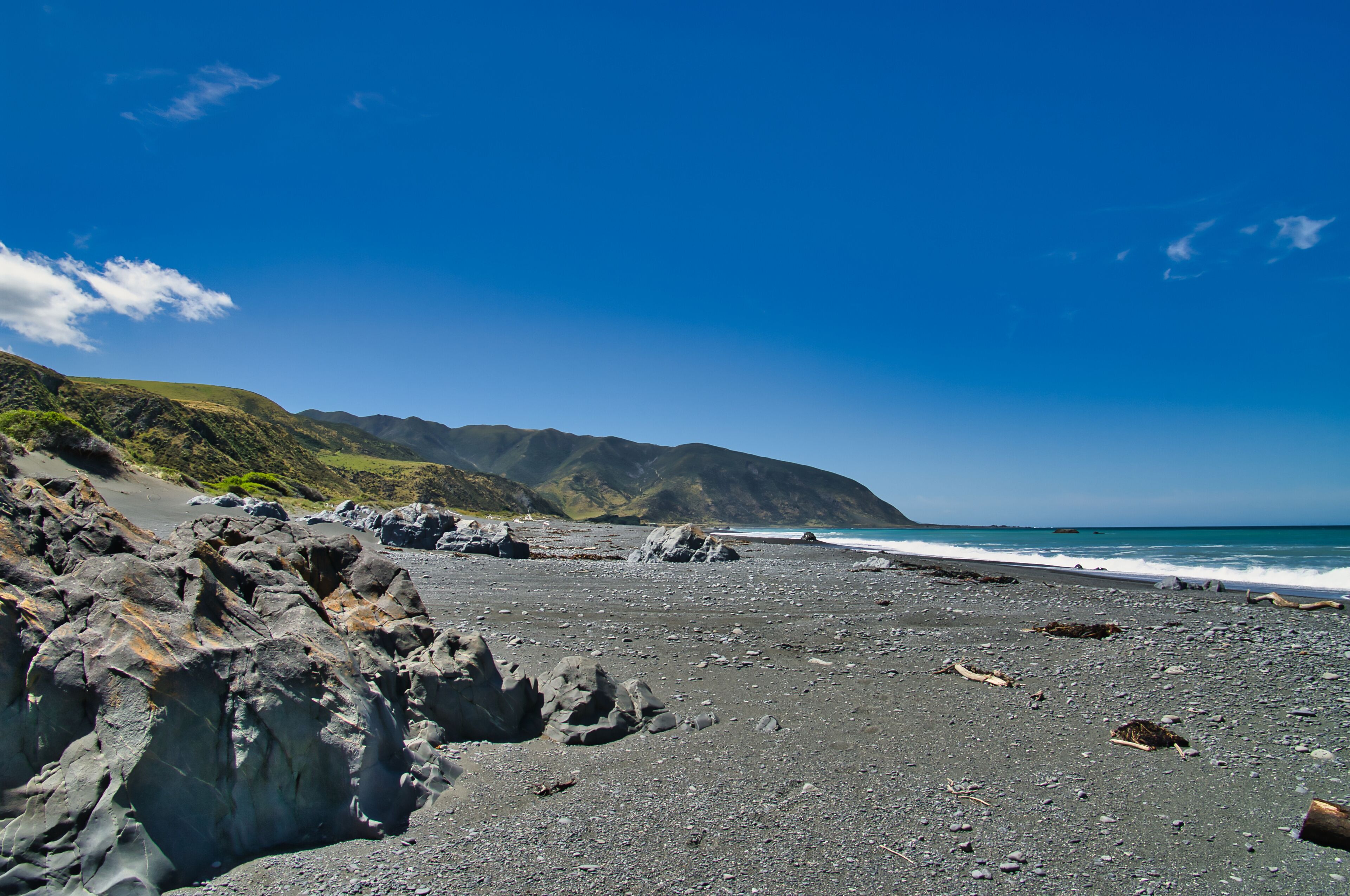 The black sand beach at the mouth of the Wainuiomata River, Baring Head, East Harbour Regional Park, Greater Wellington, New Zealand
