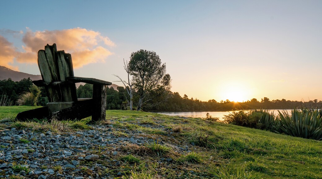 Relax with a glass of wine and enjoy the sunset over Martins Bay