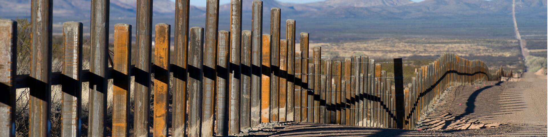 The new post & rail border fence runs along the Mexico border with Arizona.