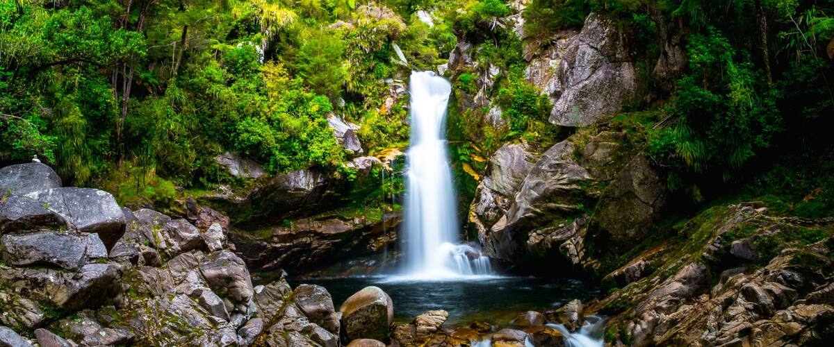 Beautiful waterfalls in the green nature, Wainui Falls, Abel Tasman, New Zealand.