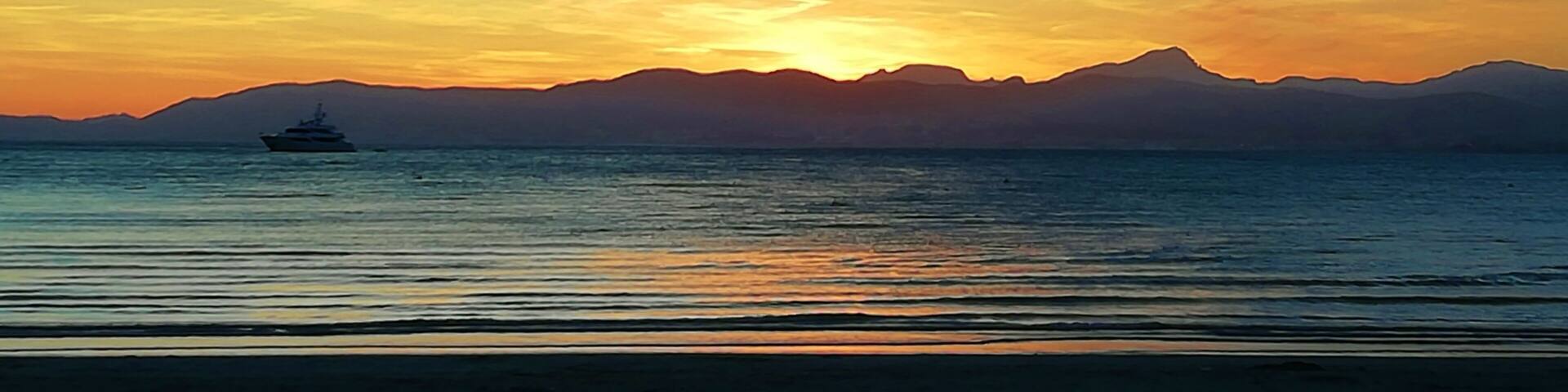 Sunset from El Arenal, favourite side of German tourists and opposite is Palmanova and Magaluf favourite side of English tourists. But we Finnish love both sides.