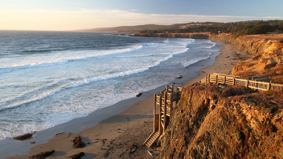 Pacific Sunset Warmth - The beach sunset invites visitors down access stairs. Black Point Beach, Sonoma Coast, California, USA