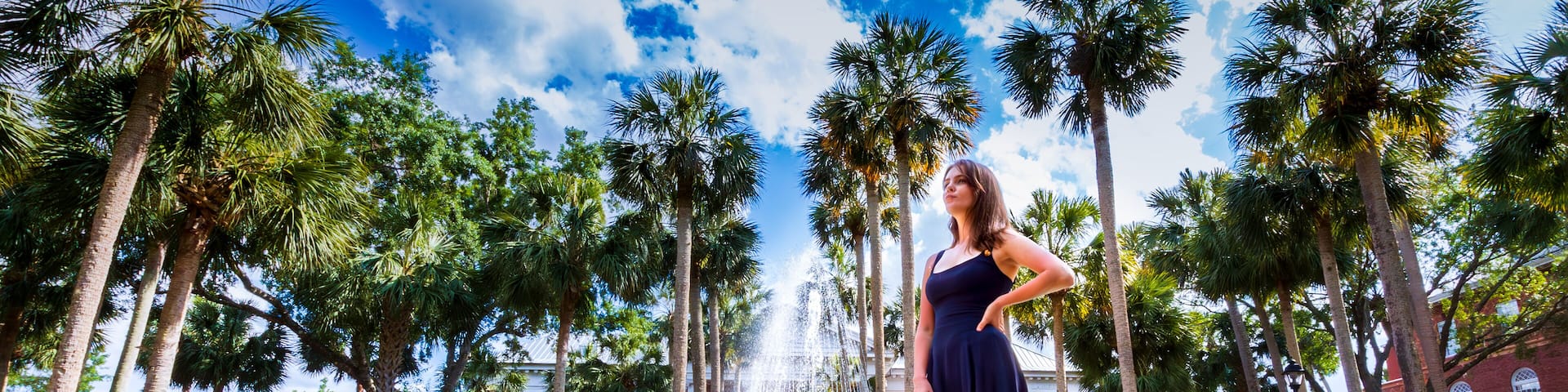 Stetson University Holler fountain woman in blue dress gazing off into the future