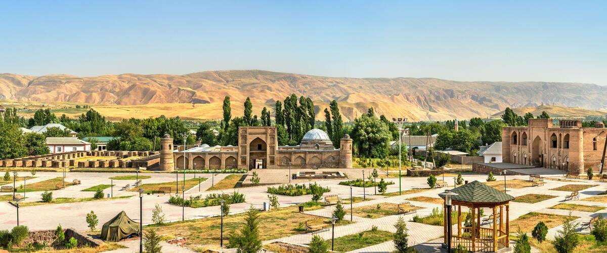 A historic site with a large mosque, a minaret, and a dome.