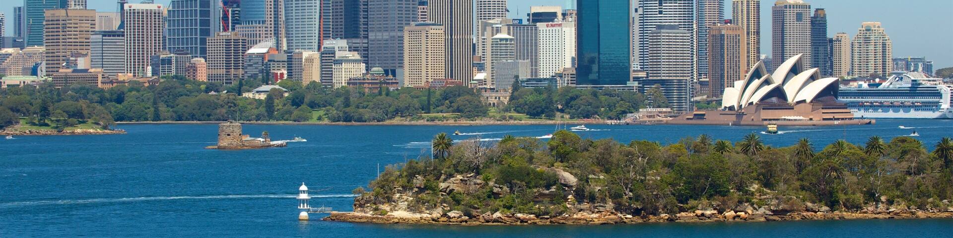 Mosman which includes a monument, a skyscraper and a bay or harbor