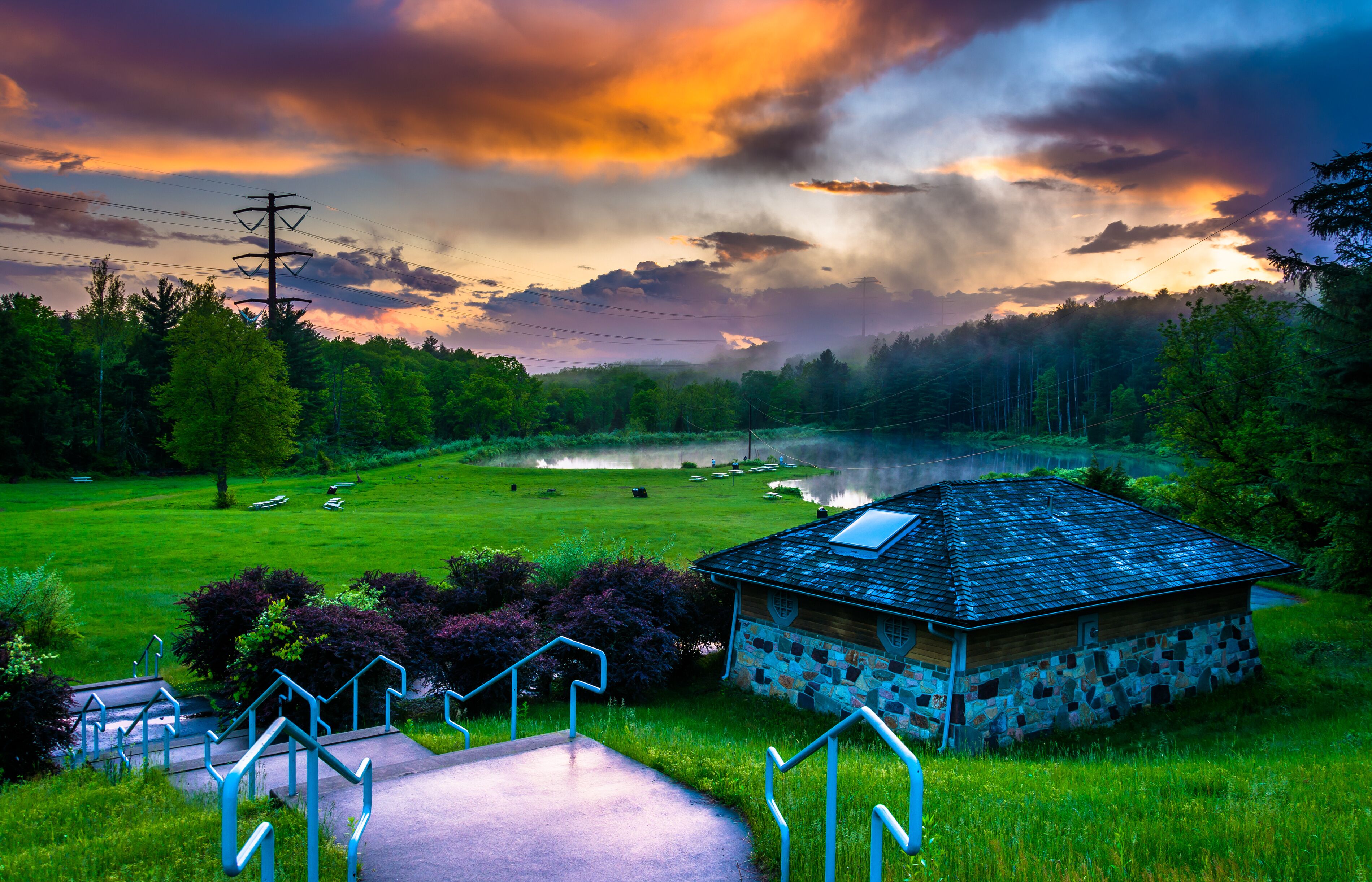 Sunset over building and ponds at Delaware Water Gap National Re
