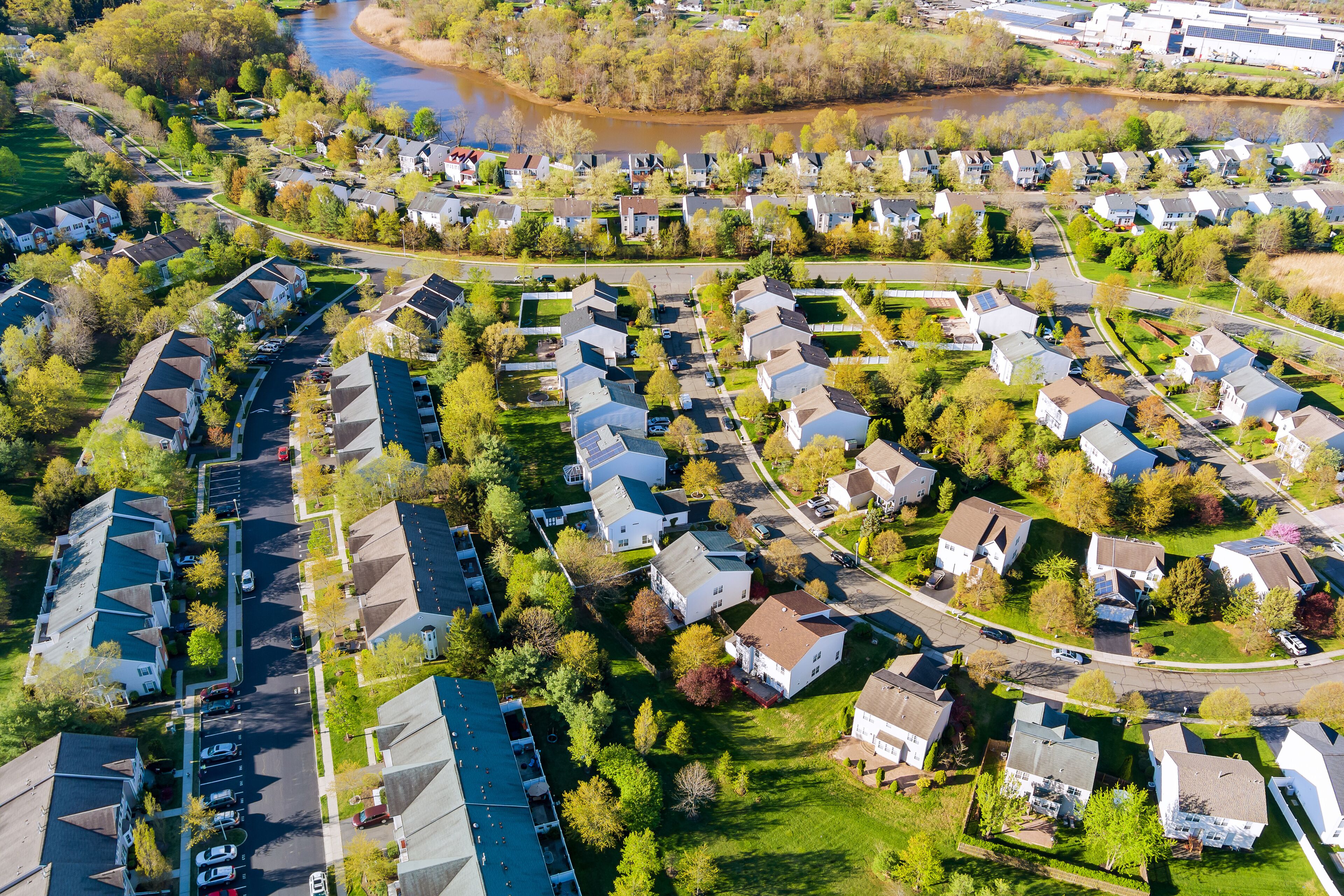 View of small town neighborhood with landscape roofs of houses