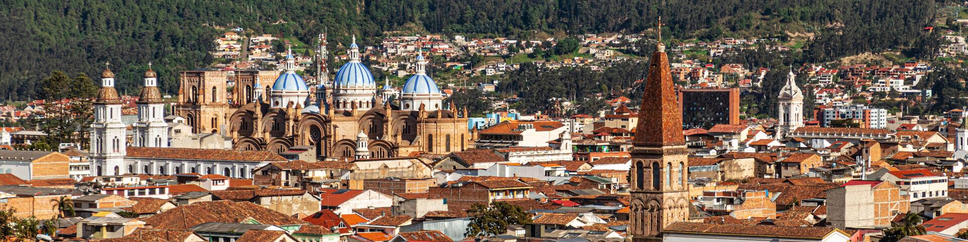 Panoramic view of the historical center of city Cuenca at the valley with its many churches. Ecuador