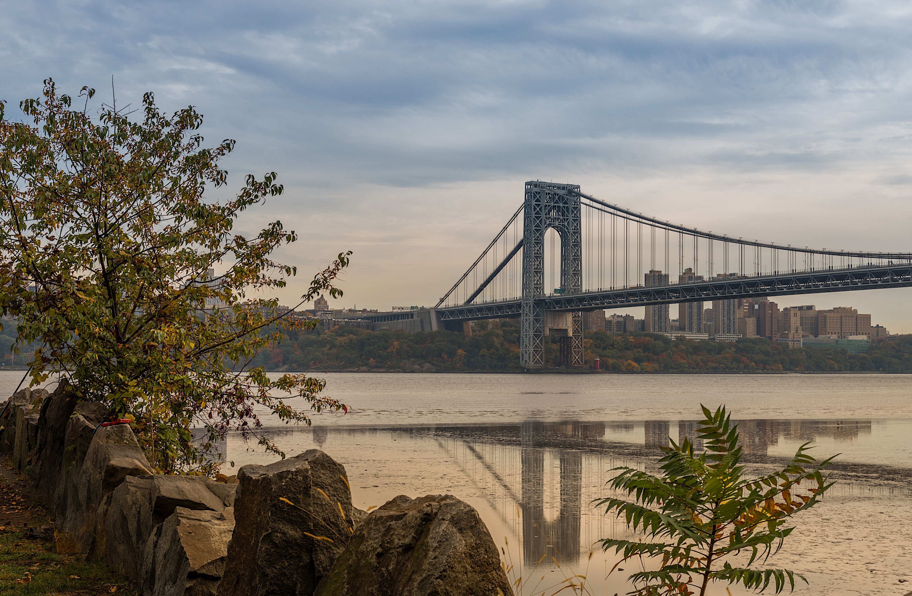 A distance view of George Washington Bridge in the evening from the  Palisades Interstate Park in New Jersey