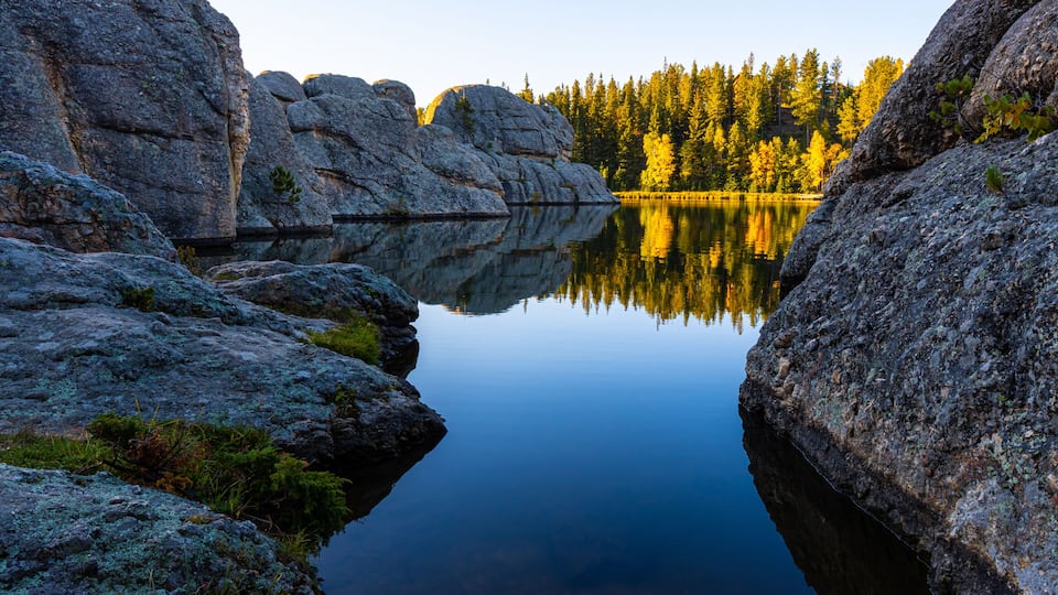 Rock Formations Reflecting on Sylvan Lake, Custer State Park, South Dakota, USA