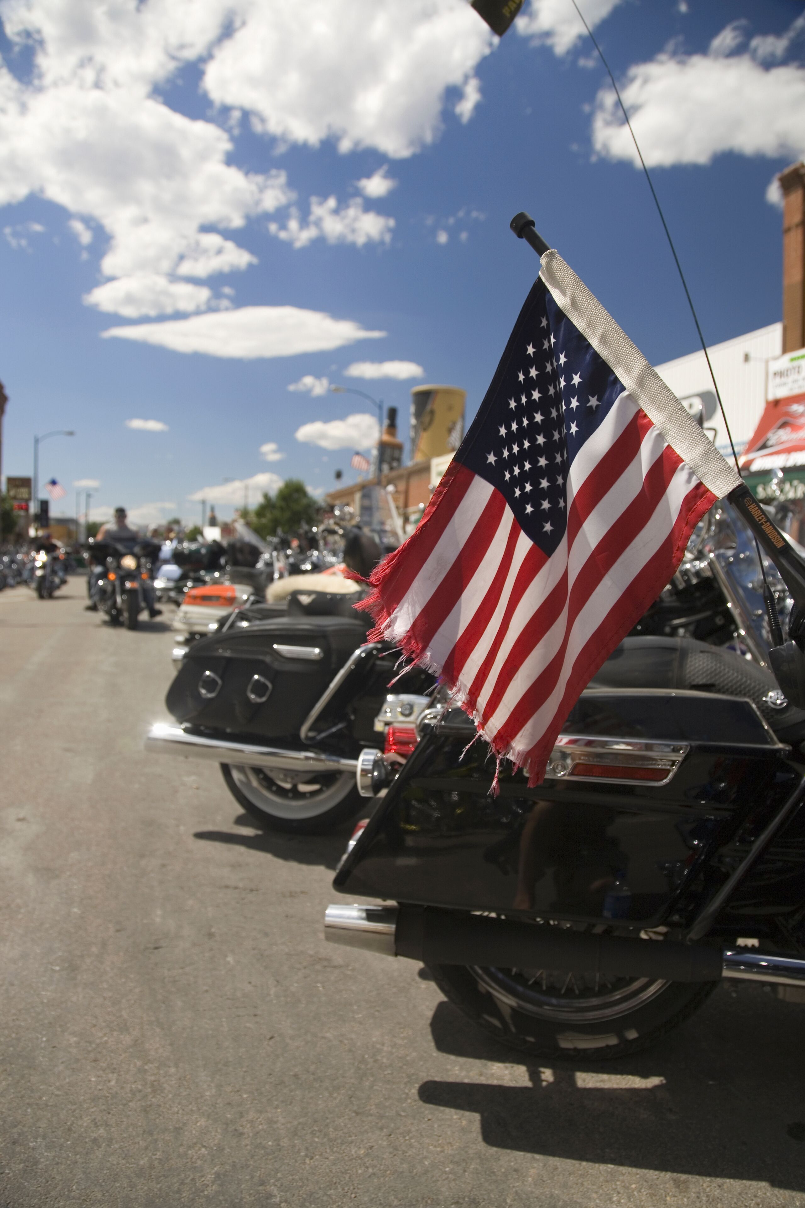 American Flag on the back of a motorcycle parked on Main Street at the 67th Annual Sturgis Motorcycle Rally, Sturgis, South Dakota, August 6-12, 2007