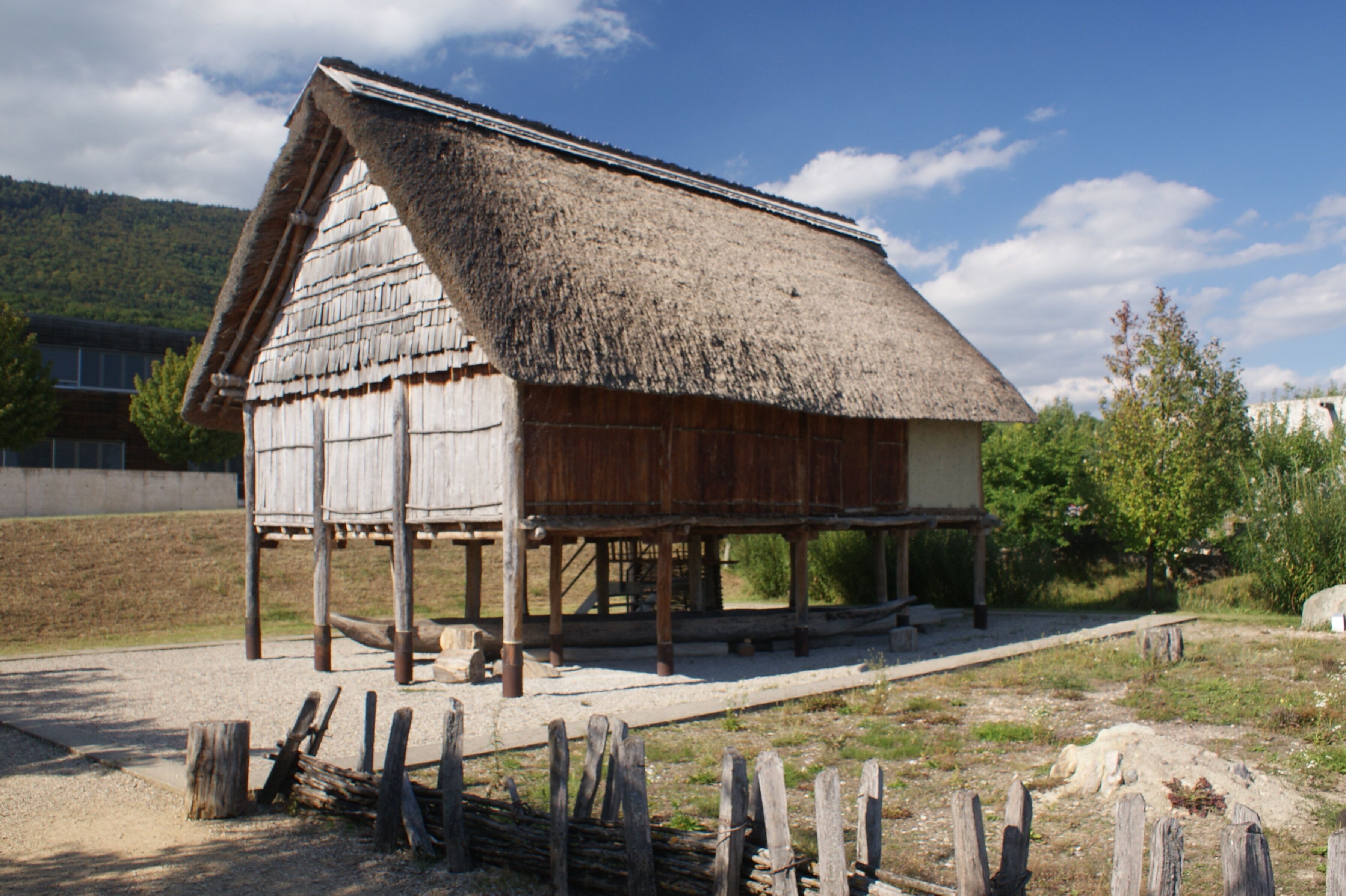 Reconstruction of a neolithic hut in the park of the Laténium museum, in Hauterive, Switzerland