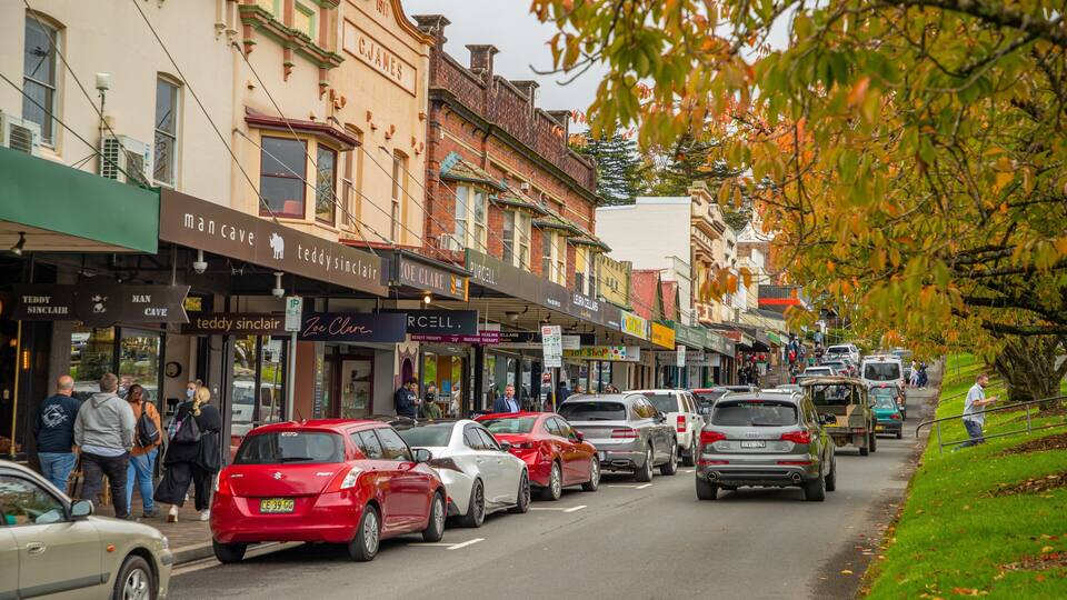 A street lined with shops, including a man cave and teddy sinclair.