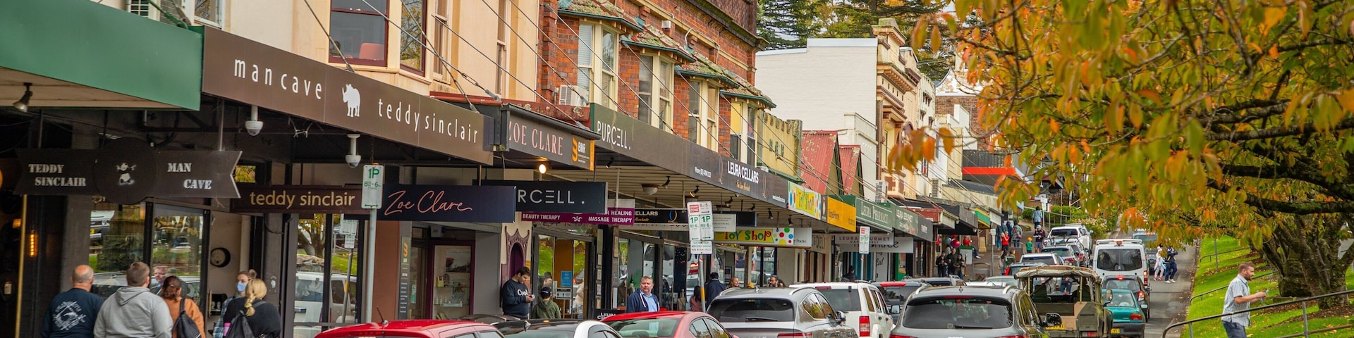 A street lined with shops, including a man cave and teddy sinclair.