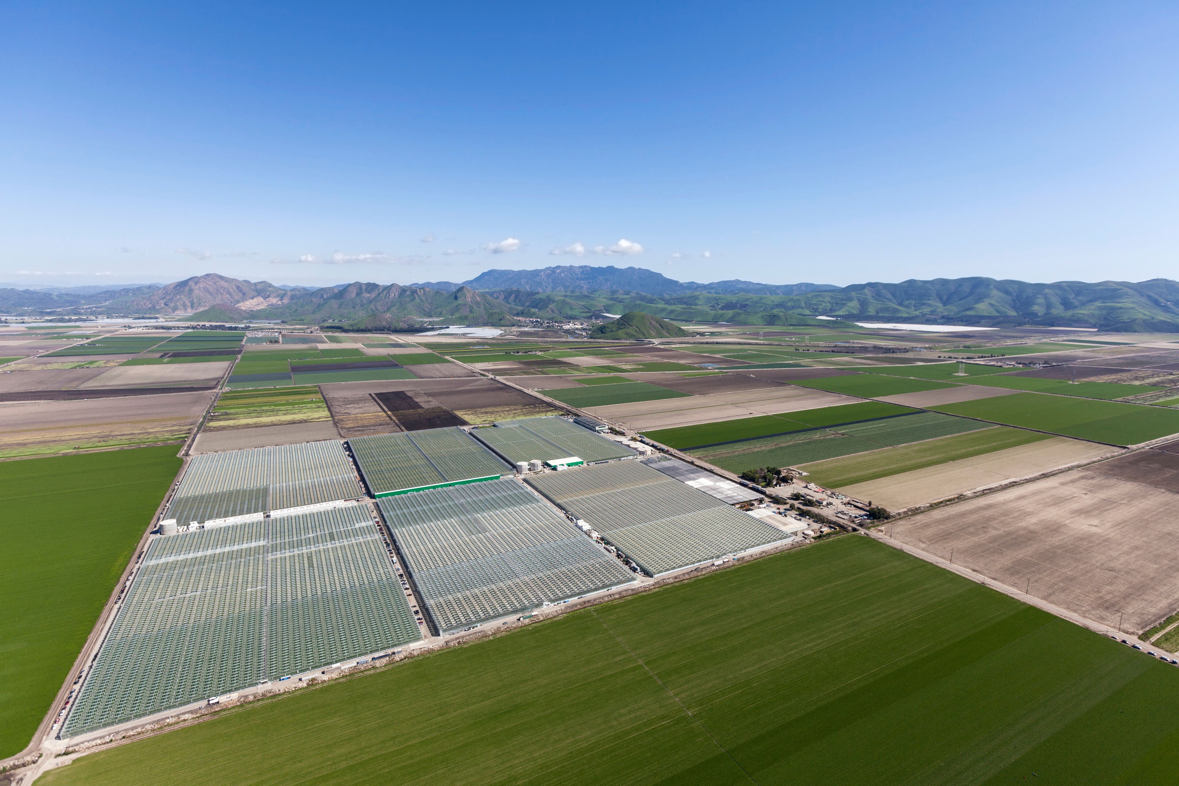 Aerial view of farm fields and the Santa Monica Mountains near Camarillo in scenic Ventura County, California. 