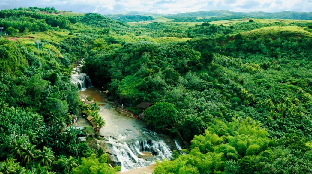 Guam featuring landscape views, rapids and a waterfall