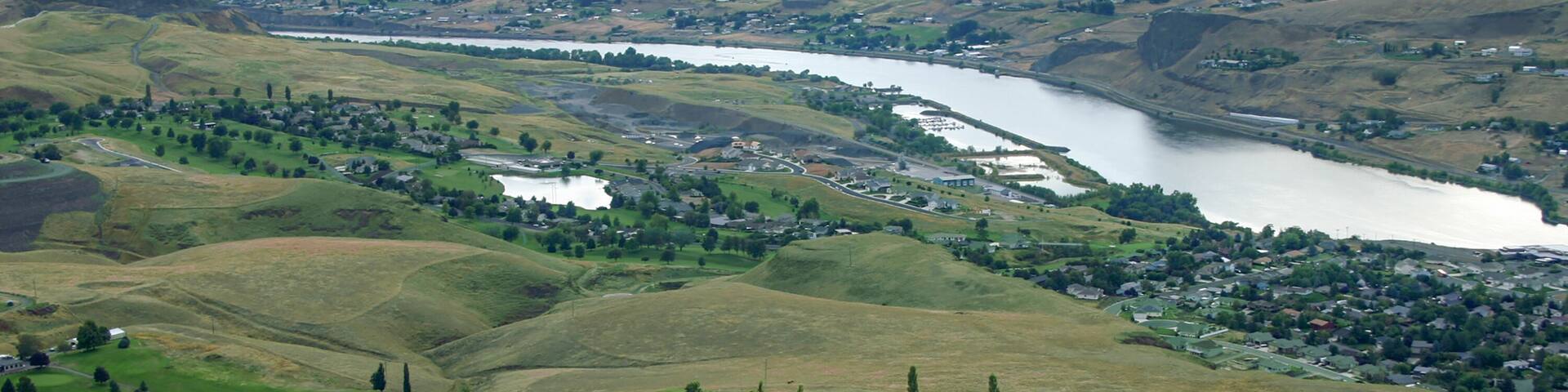 Aerial photo of Lewiston Country Club, Bryden Canyon Golf Course, Quail Ridge Golf Course and a marina on Snake River boasting retirement activities in the LC Valley