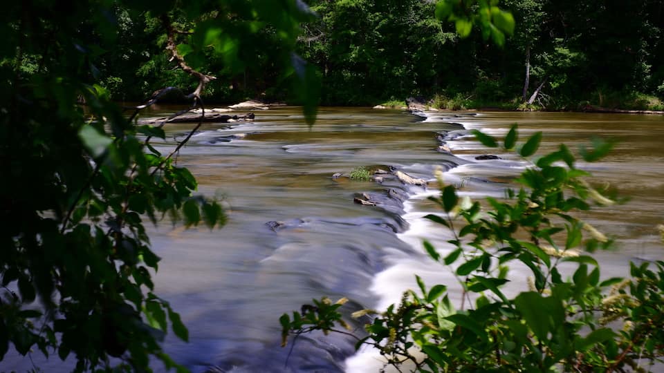 Sweetwater Creek Tumbles Gently Over a Span of Stones.