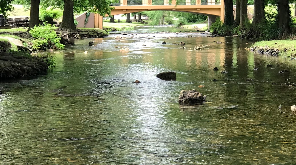 Park with Creek Stream of Water and Bridge in Tahlequah Oklahoma at Seqoyah City Park