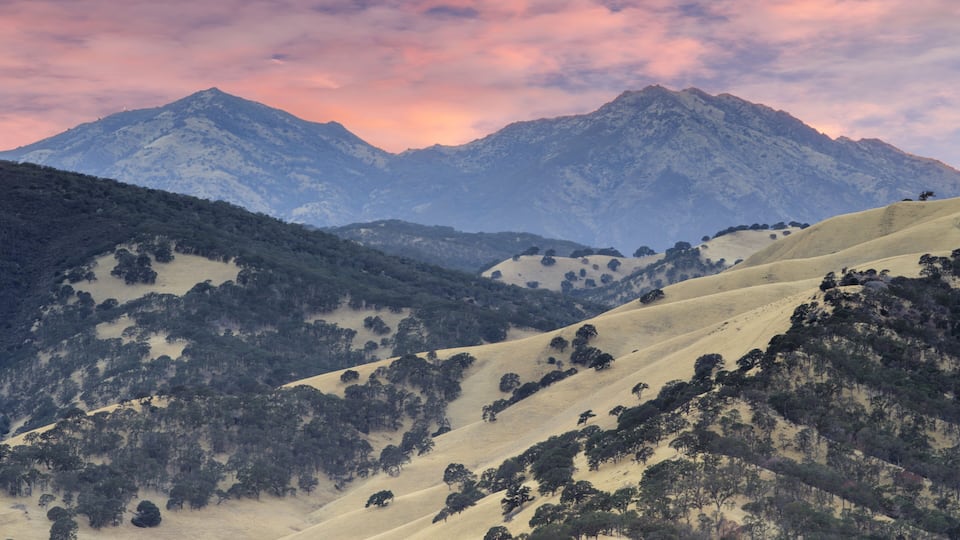 Mount Diablo as seen from the summit of Round Valley Regional Preserve on a summer sunset. Contra Costa County, California, USA.