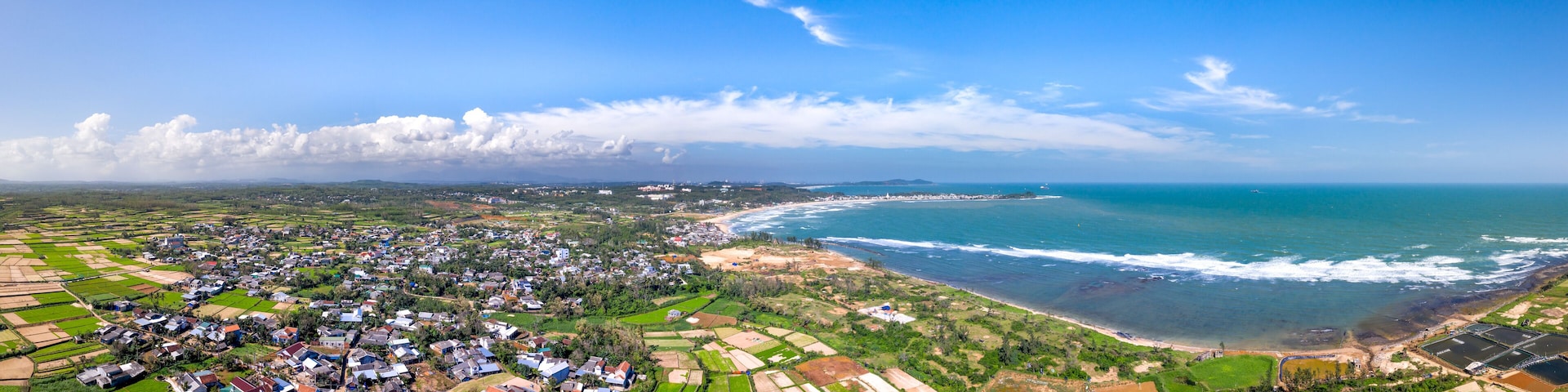 A panoramic view of the fields by the sea in Tinh Khe commune, Binh Son district, Quang Ngai province, Vietnam. View from above