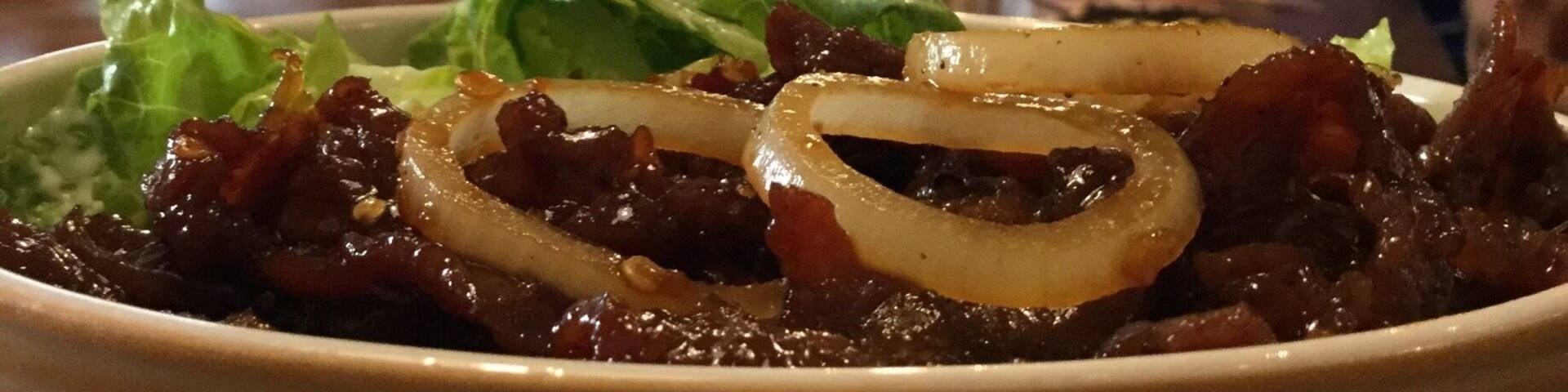 Spicy beef bowl and endless board games to play with all day long! It's a very cool board game cafe.