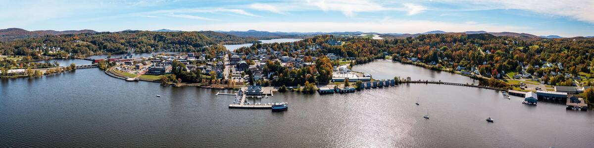 Aerial view of the city of Newport in Vermont from above the lake with autumn colors and leaves
