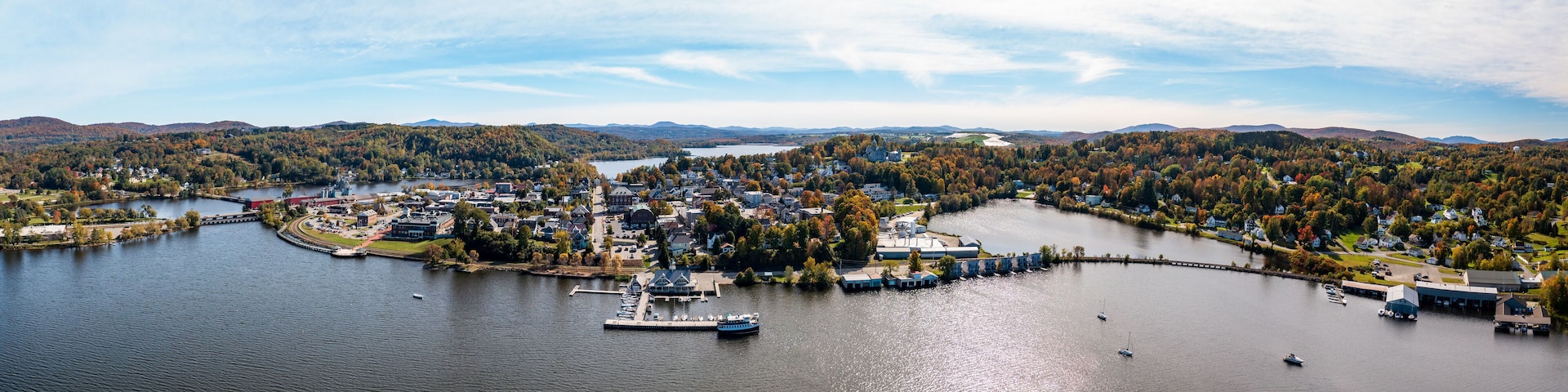 Aerial view of the city of Newport in Vermont from above the lake with autumn colors and leaves