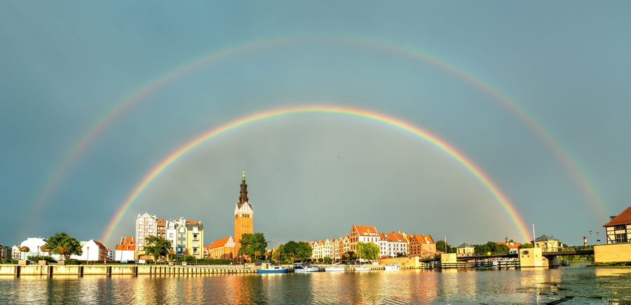 Double rainbow above Elblag town in Poland