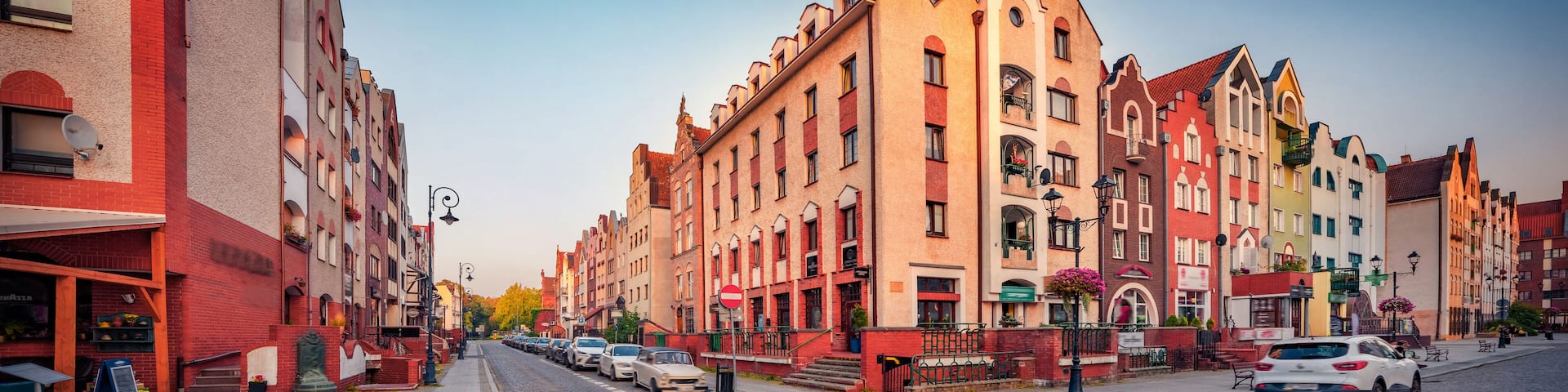 Splendid summer cityscape of Elblag town, Warmian-Masurian Voivodeship, Poland, Europe. Colorful buildings and empty street at early morning in Elblag city. Urban concept background..