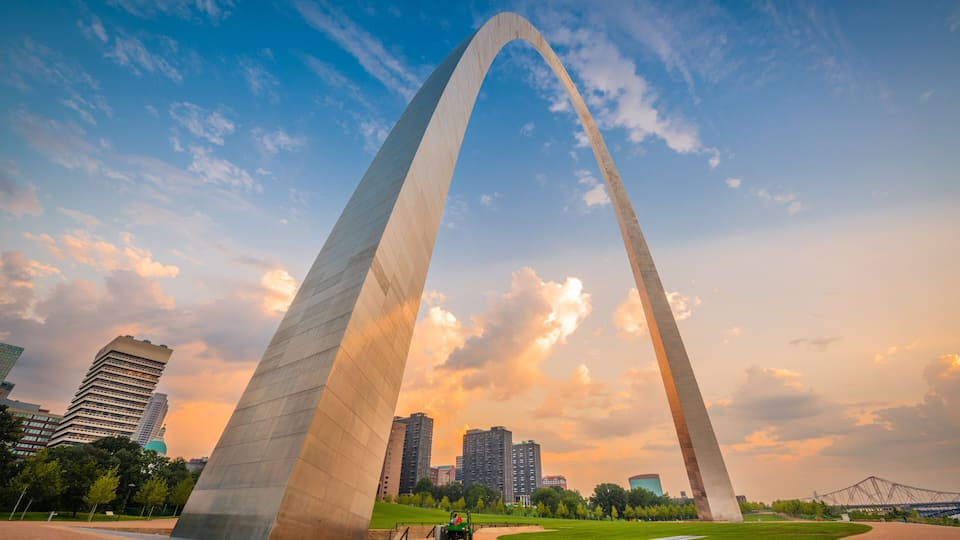 The Gateway Arch in St. Louis, Missouri, with a cityscape in the background.
