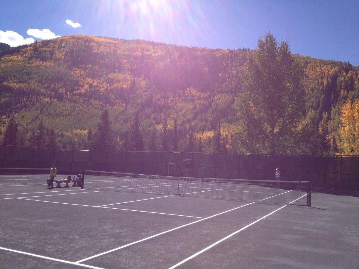 The courts here are clay. And they are pristine!  And how do you beat that view of Aspen changing in the background?!? Hard to focus on the ball with that view!  Unfortunately, the courts close on September 28 for the season.