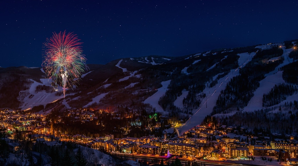 Vail which includes nightlife, night scenes and a small town or village