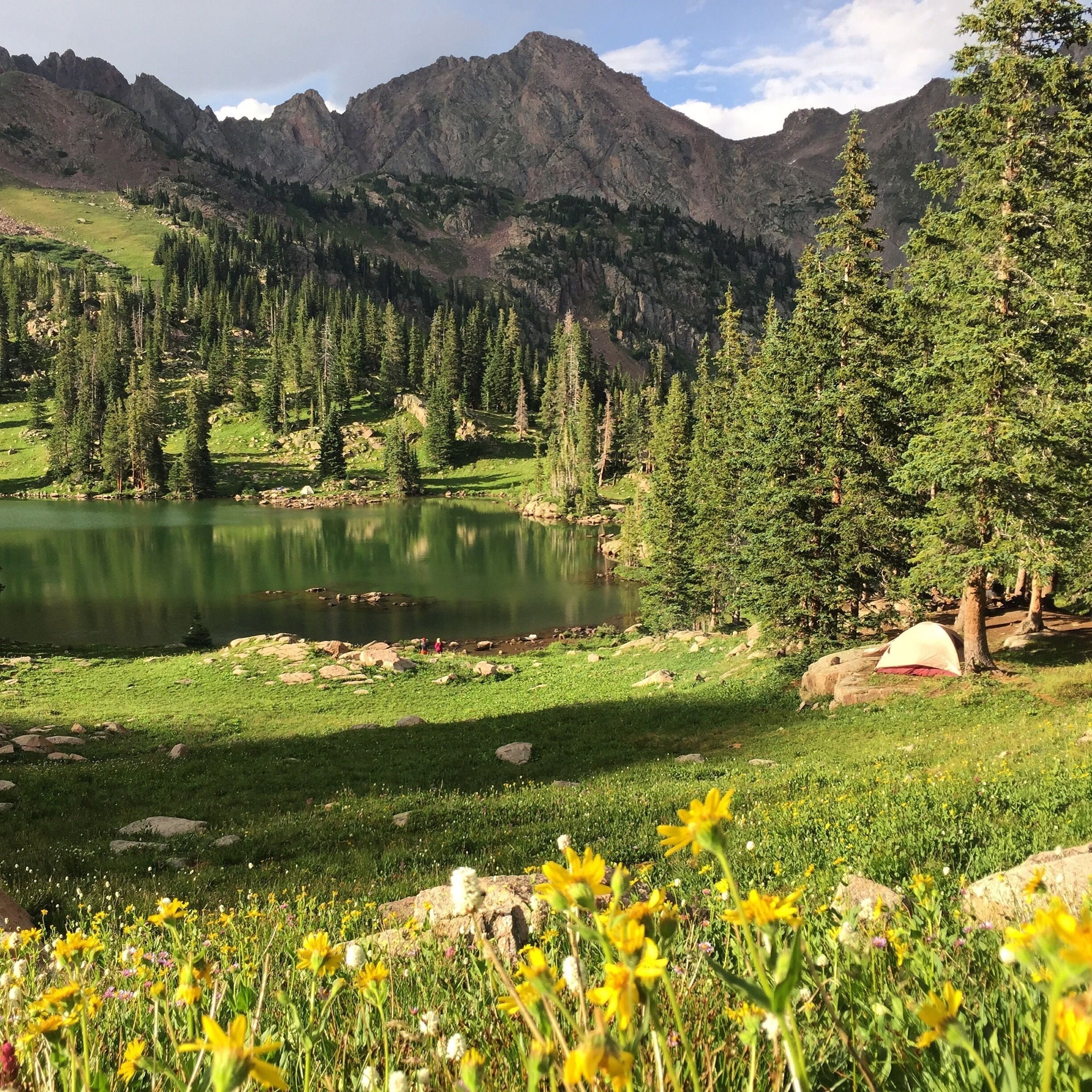 Gore Lake is one of the best hiking and camping trips I've ever experienced! The Gore Creek trail starts at a trail head in East Vail, and climbs 3,400 vertical feet over 6 miles. By no means an easy hike, but worth every step. Vibrant wildflowers pave the way along Gore Creek, through Aspen groves and ultimately to the lake at the top. Amazing campsites are everywhere, no permits needed!