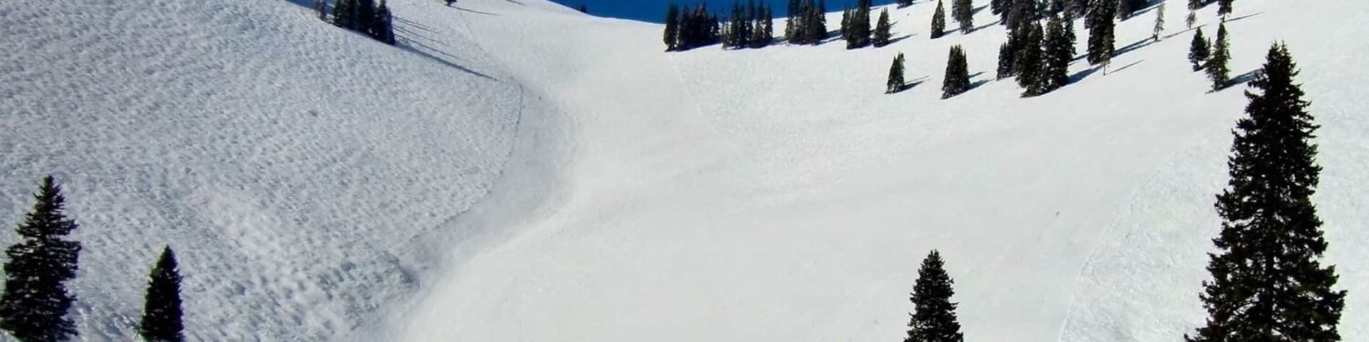 Years before it was officially open to skiers, China Bowl had been named for its headwall, visible now from the top of Orient Express, Chair 21. This long limestone formation reminded early Vail skiers of the Great Wall of China.
