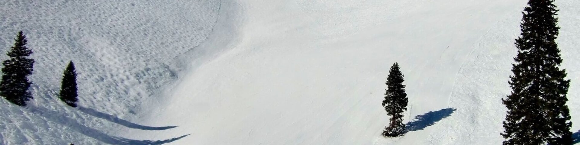 Years before it was officially open to skiers, China Bowl had been named for its headwall, visible now from the top of Orient Express, Chair 21. This long limestone formation reminded early Vail skiers of the Great Wall of China.