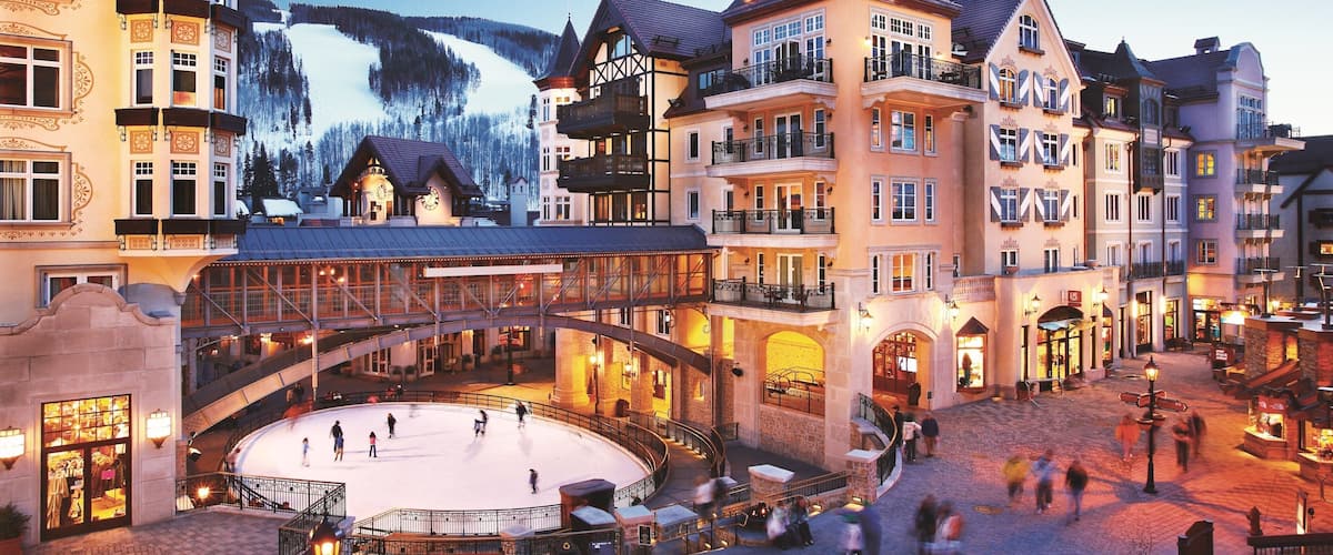 Vail which includes ice skating, a square or plaza and snow