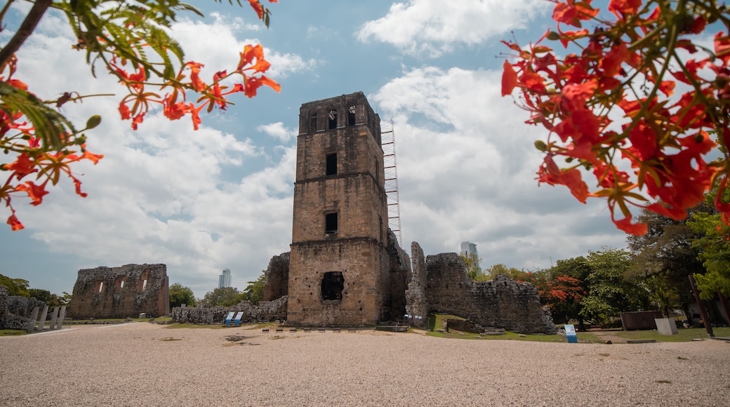 View of Panama Viejo historical city, first settlement of panama city, main square and evangelino Jimenez tower visible, big panama backdrop in the background with skyscrapers.